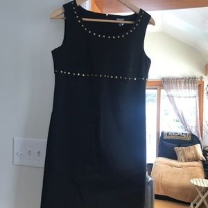 Black dress with gold hardware